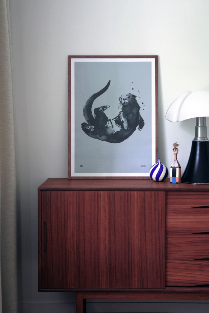 Water blue Otter Poster in wooden frame